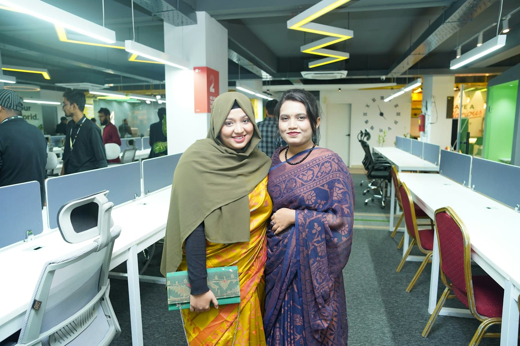 Colleagues talking in an office
